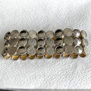 Silver tone circular medallion elasticized bracelet